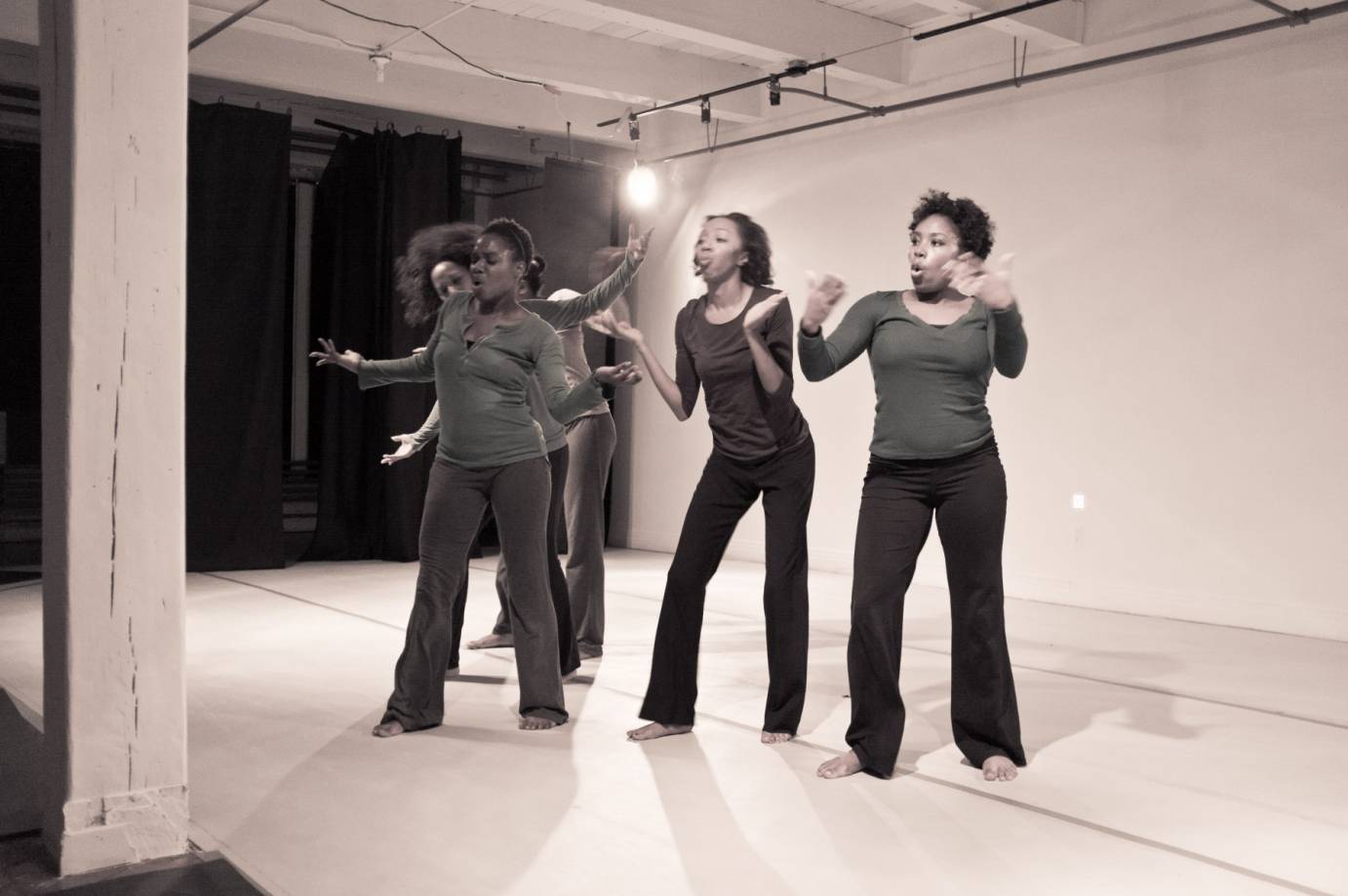 Erika Stowall dancing with the women of Red Wall Dance